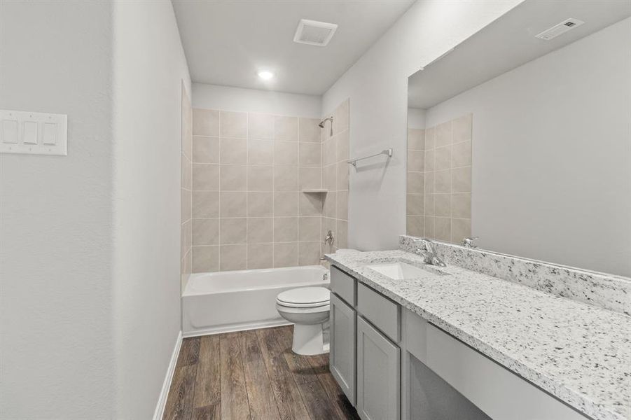 Furnished interior view inside a new home in Rocky Creek Crossing, Crowley (Image 5).