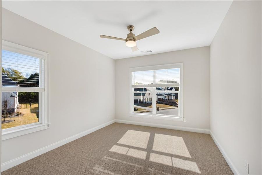 Spacious, unfurnished interior of a new home in The Retreat at Caney Creek, Alpharetta (Image 25).