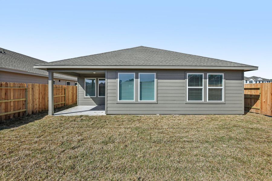 Exterior details and patio area of a home in Landing Meadows - Premier Series, New Caney (Image 25).