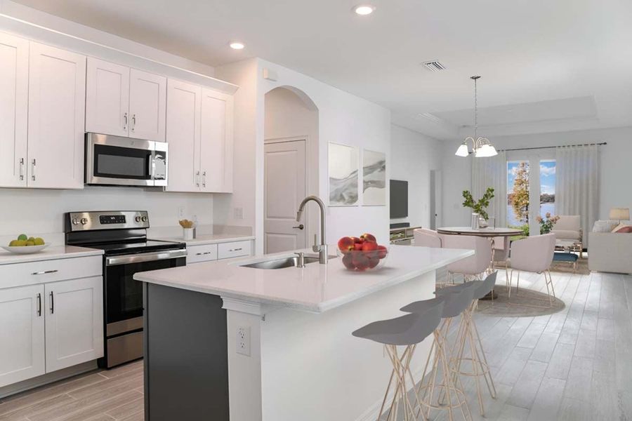 Representative furnished interior of a home built from the Flora by William Ryan Homes in The Sanctuary – Coastal Collection, Punta Gorda (Image 8). Representative furnished interior of a home built from the Flora by William Ryan Homes in The Sanctuary – Coastal Collection, Punta Gorda (Image 8).