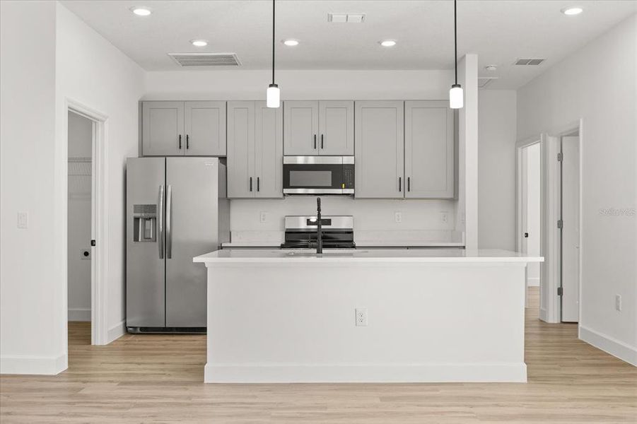 Furnished interior view inside a new home in , Kissimmee (Image 6).