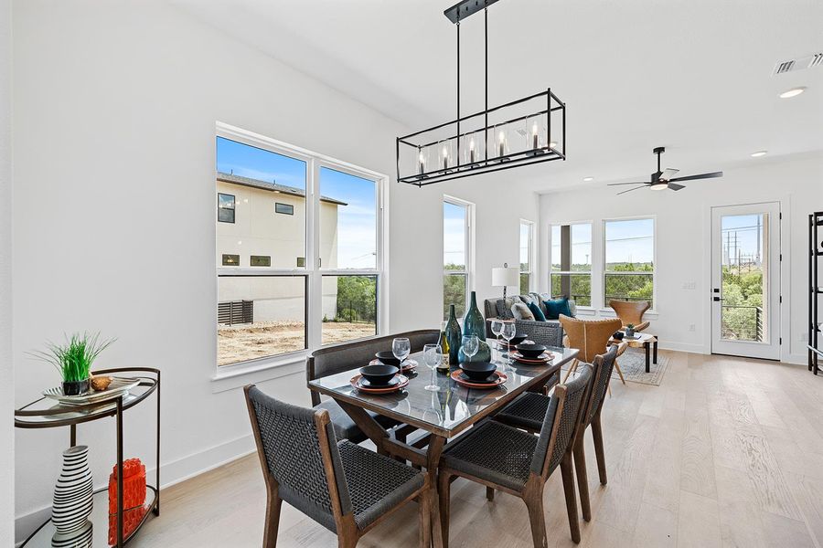 Open floor plan brings the outdoors in and ties family living room in