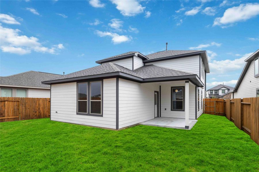 Front exterior of a new home in Granger Pines, Conroe, TX, highlighting curb appeal (Image 15). Front exterior of a new home in Granger Pines, Conroe, TX, highlighting curb appeal (Image 15).