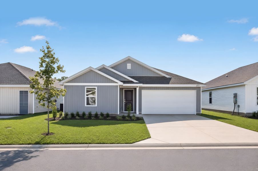 Front exterior of a new home in Bay Springs Majors, Defuniak Springs, FL, highlighting curb appeal (Image 1). Front exterior of a new home in Bay Springs Majors, Defuniak Springs, FL, highlighting curb appeal (Image 1).