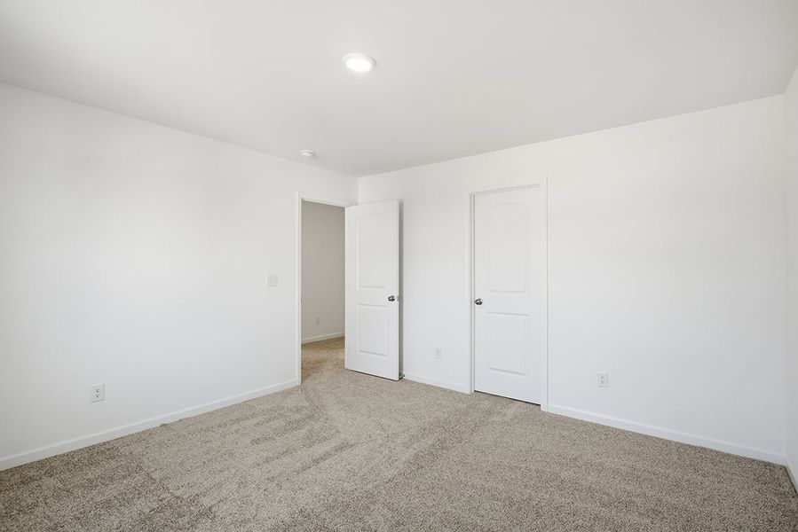 A room with white doors. A room with white doors.