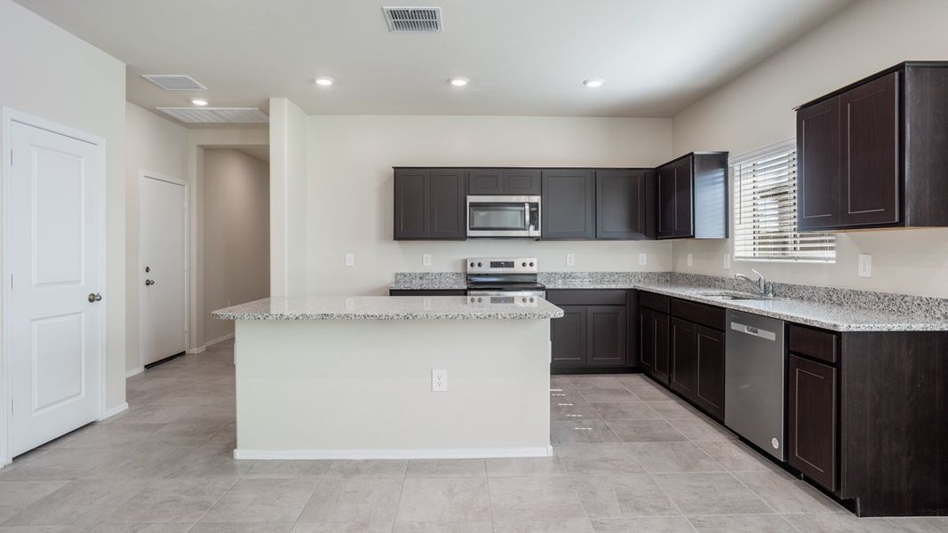 Representative furnished interior of a home built from the Blackstone by D.R. Horton in Rio Rancho Estates, Surprise (Image 9). Representative furnished interior of a home built from the Blackstone by D.R. Horton in Rio Rancho Estates, Surprise (Image 9).