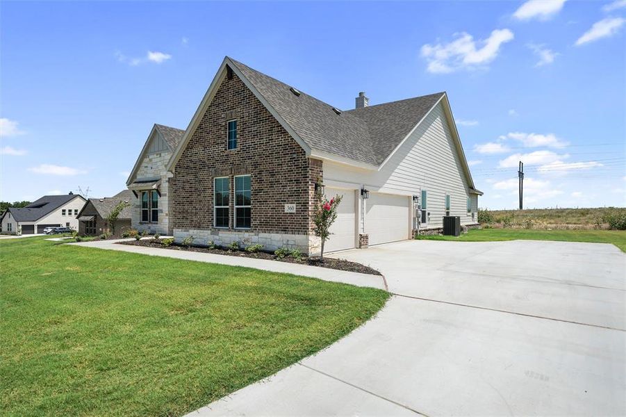 Front exterior of a new home in Parker Heights, Valley View, TX, highlighting curb appeal (Image 2). Front exterior of a new home in Parker Heights, Valley View, TX, highlighting curb appeal (Image 2).