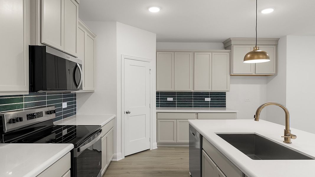 Furnished interior view inside a new home in Keeneland 40s, Aubrey (Image 9).