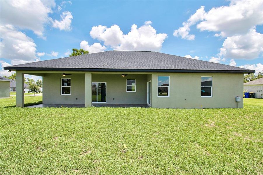 Exterior details and patio area of a home in , Sebring (Image 23).