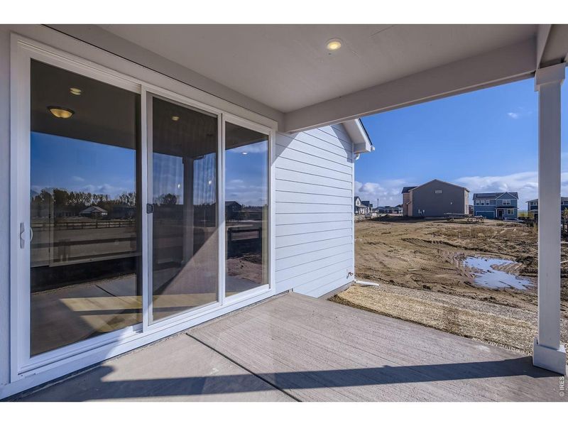 Exterior details and patio area of a home in Country Club Reserve, Fort Collins (Image 21).