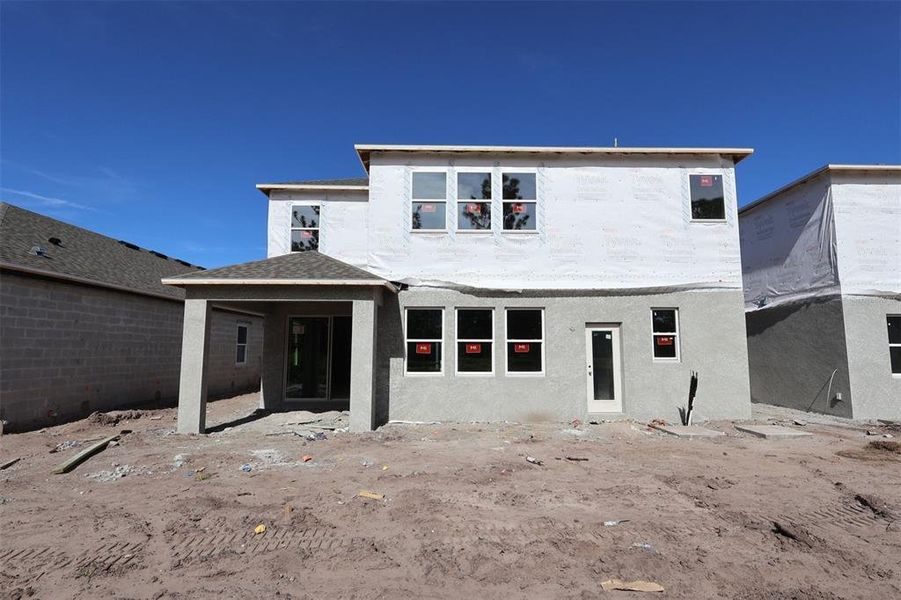 In-progress construction of a new home in Eden at Crossprairie, St. Cloud, FL (Image 10).