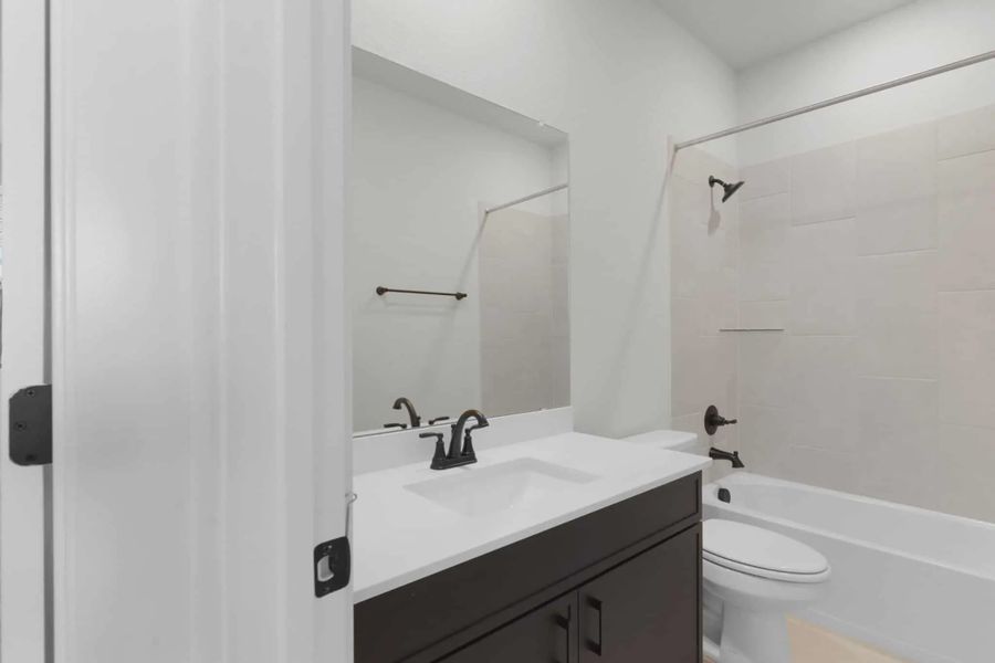 Representative furnished interior of a home built from the Julia by Chesmar Homes in Nolina, Georgetown (Image 5).