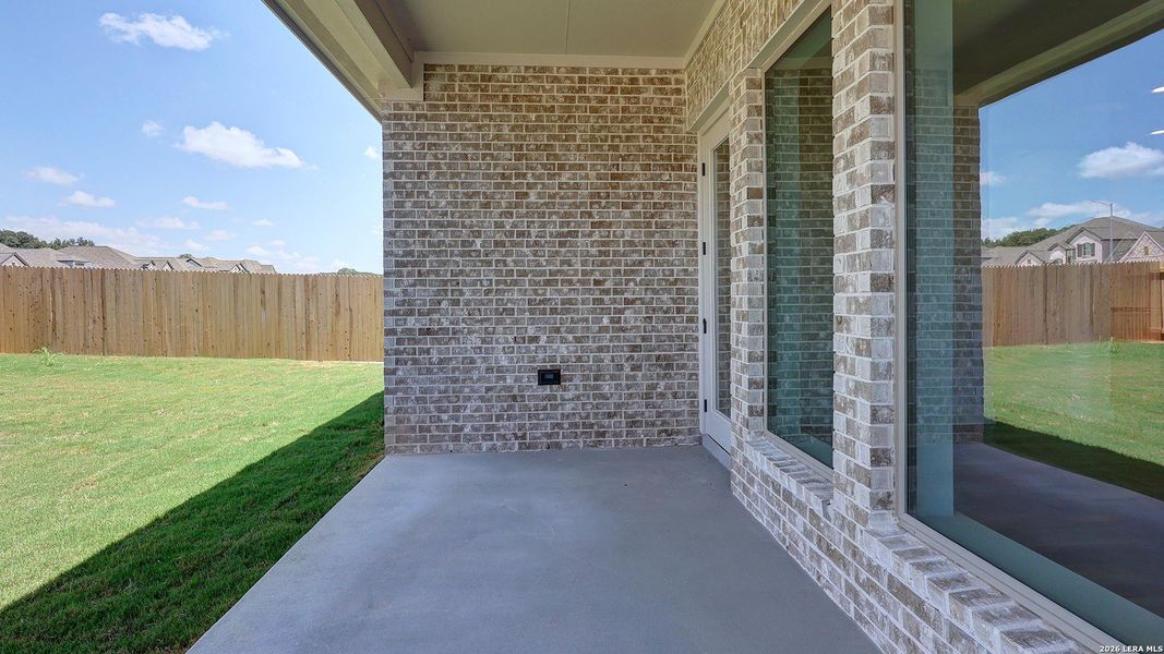 Exterior details and patio area of a home in Kallison Ranch, San Antonio (Image 26).