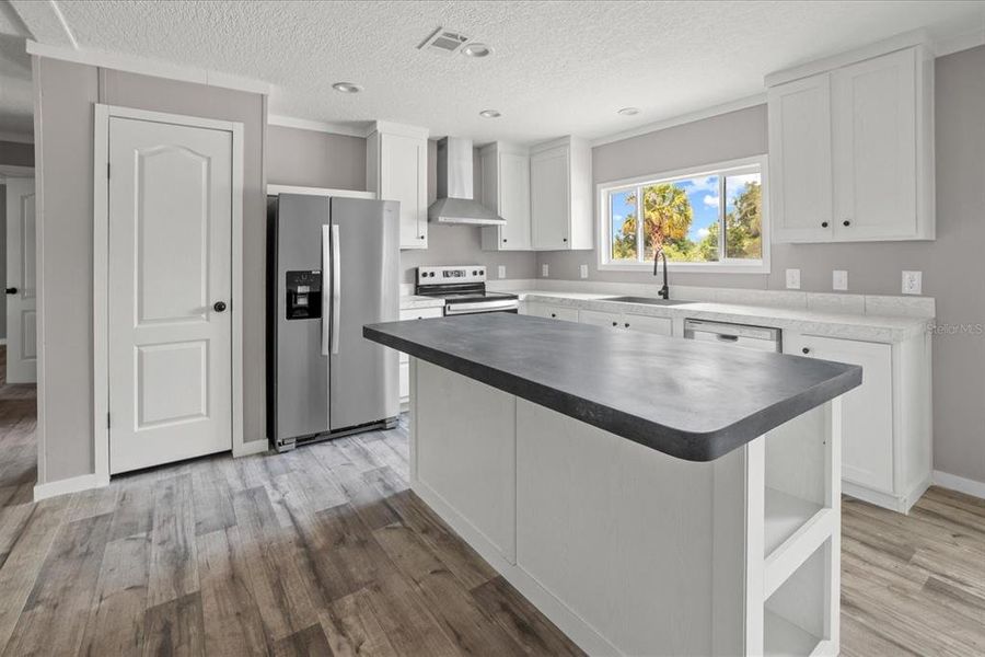 Furnished interior view inside a new home in , Okeechobee (Image 6).