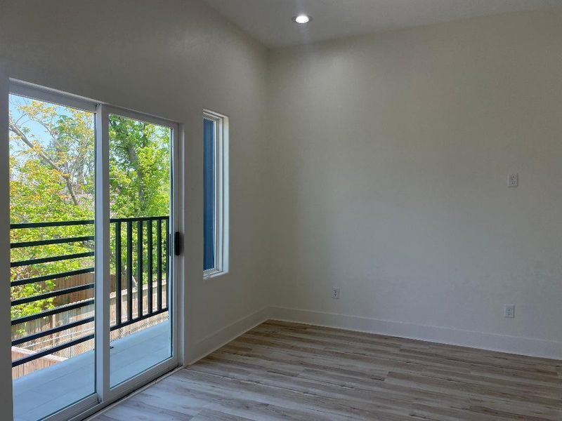 Balcony off of the living room perfect for the night views of the city of Houston