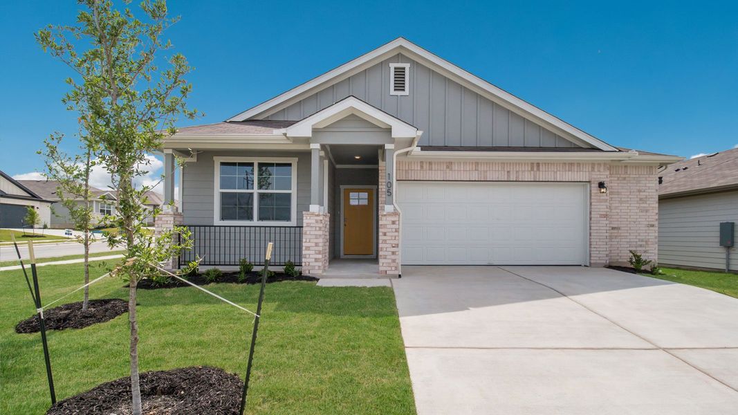 Representative exterior photo of a completed home built from the The Reagan II by D.R. Horton in Talavera, Kyle, TX (Image 9).