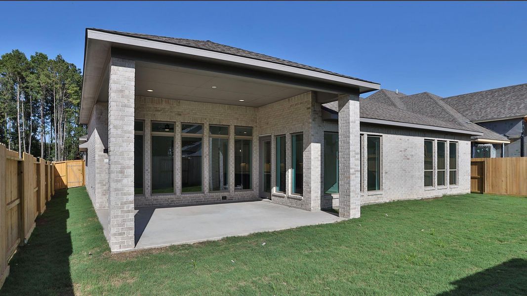 Exterior details and patio area of a home in The Highlands, Porter (Image 3).