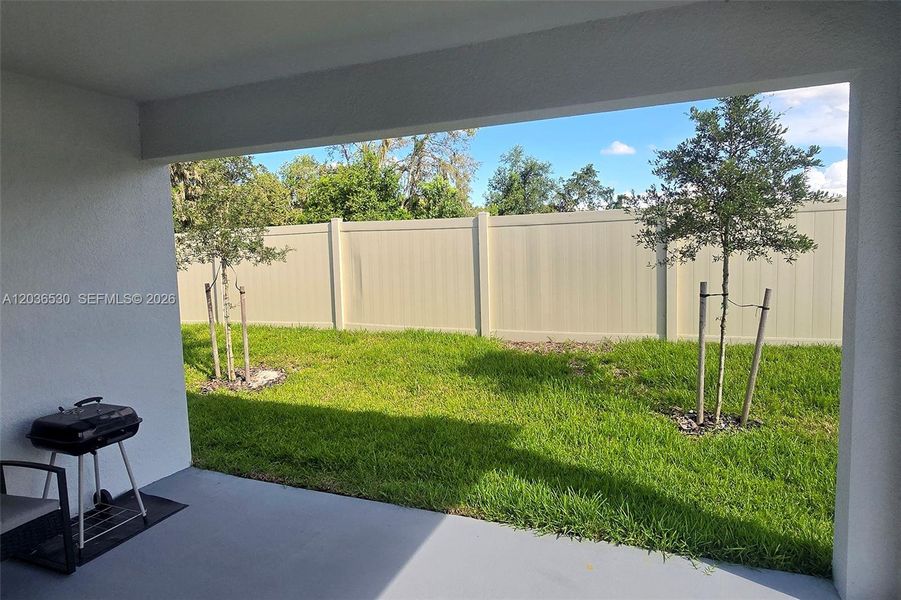 Exterior details and patio area of a home in Hammock Reserve, Haines City (Image 3).