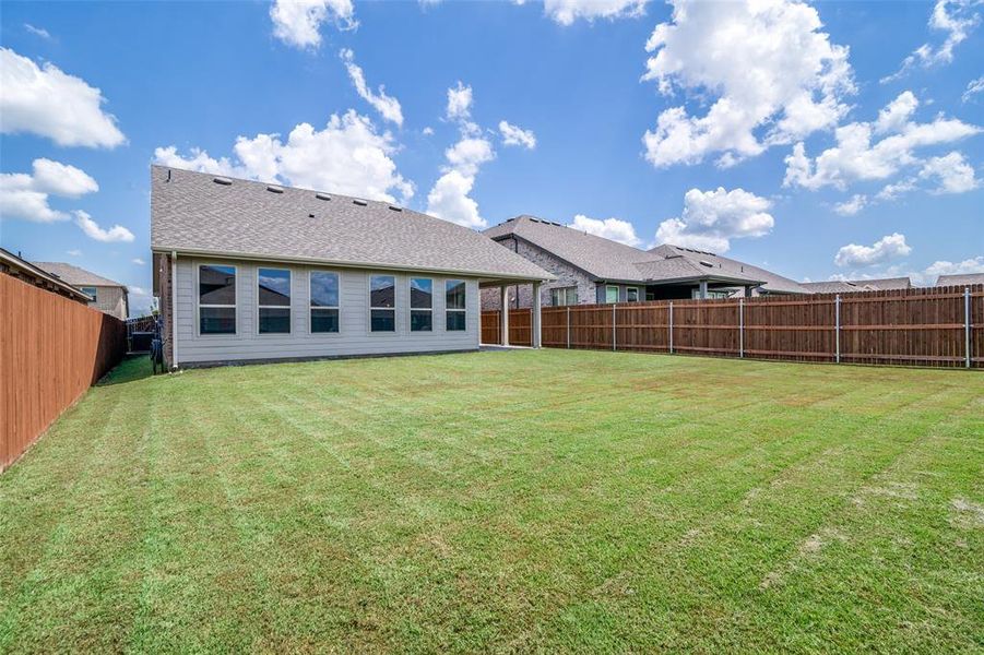 Front exterior of a new home in Heartland, Heartland, TX, highlighting curb appeal (Image 19). Front exterior of a new home in Heartland, Heartland, TX, highlighting curb appeal (Image 19).