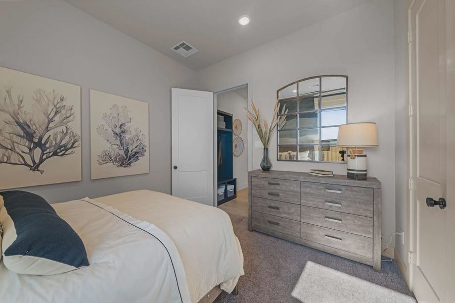 Representative furnished interior of a home built from the Hampton by Chesmar Homes in Meridiana 50's and 60's, Manvel (Image 6).