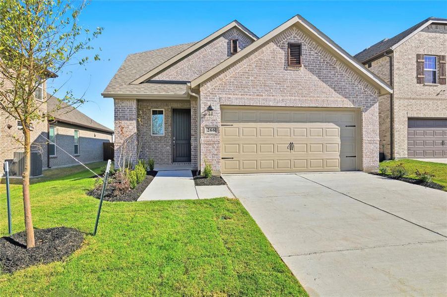 Front exterior of a new home in Elevon, Lavon, TX, highlighting curb appeal (Image 20).