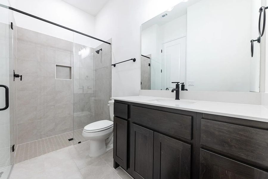 Furnished interior view inside a new home in Parmer Ranch 60, Georgetown (Image 10).