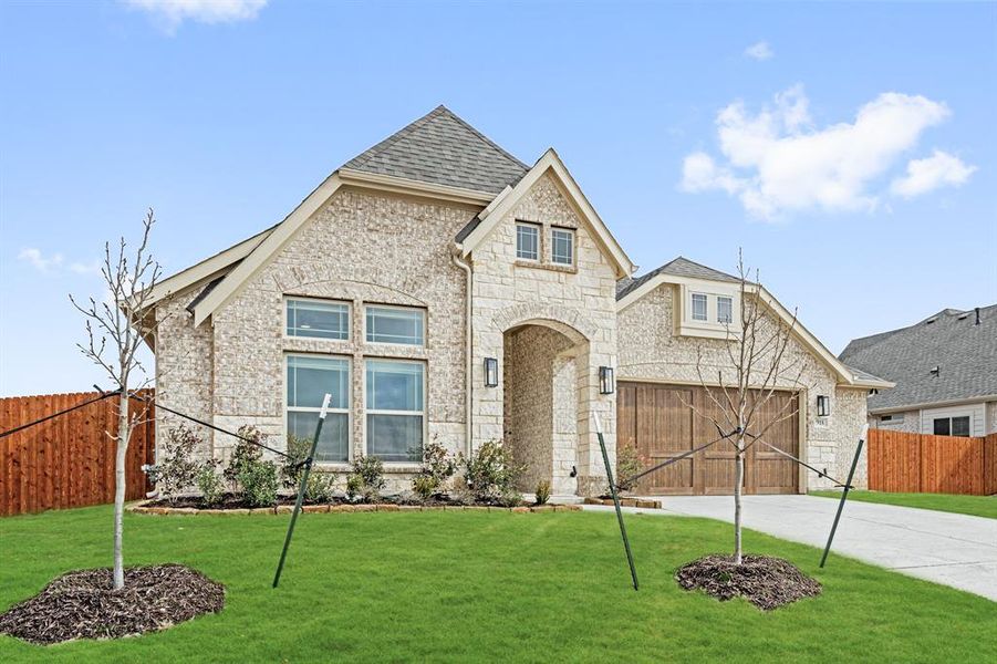 Front exterior of a new home in Mockingbird Heights Classic 80, Midlothian, TX, highlighting curb appeal (Image 21). Front exterior of a new home in Mockingbird Heights Classic 80, Midlothian, TX, highlighting curb appeal (Image 21).