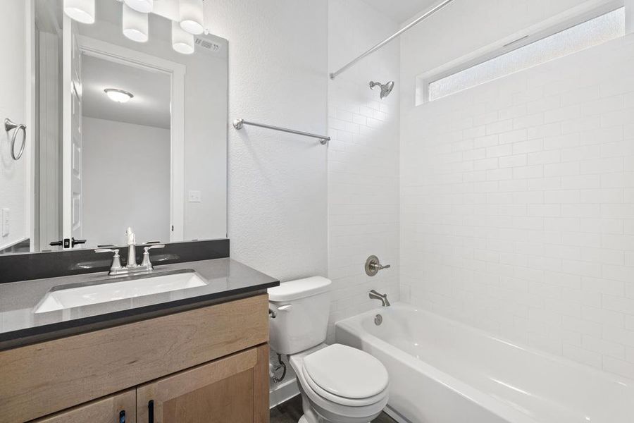 Furnished interior view inside a new home in Park Collection at Lariat, Liberty Hill (Image 4). Furnished interior view inside a new home in Park Collection at Lariat, Liberty Hill (Image 4).