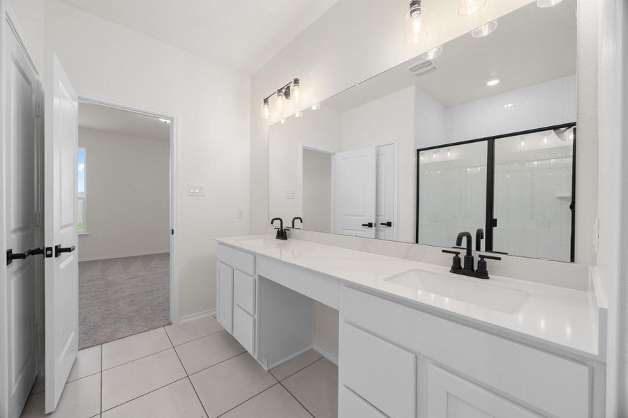 Furnished interior view inside a new home in Mustang Valley, Manor (Image 11).