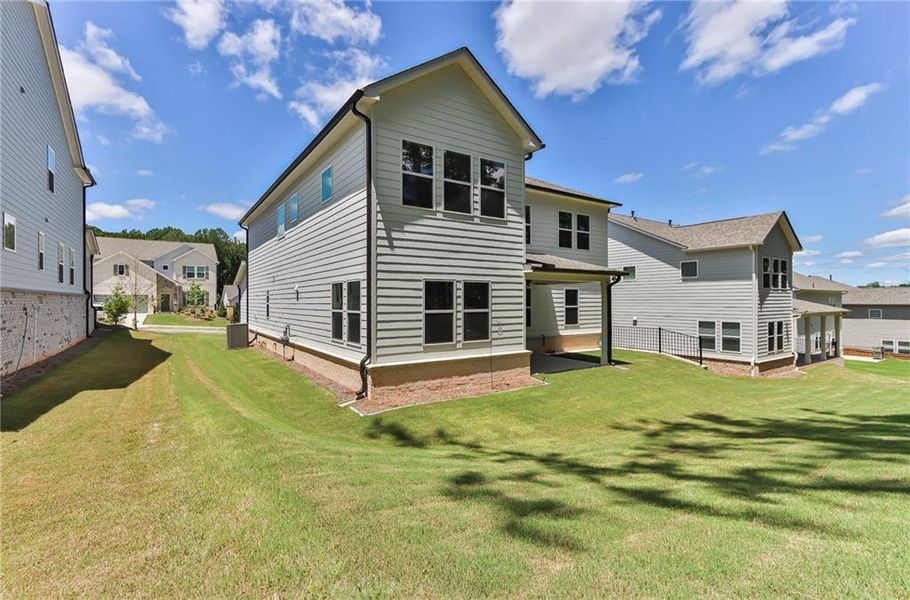 Exterior details and patio area of a home in Bailey Fence, Dacula (Image 24).