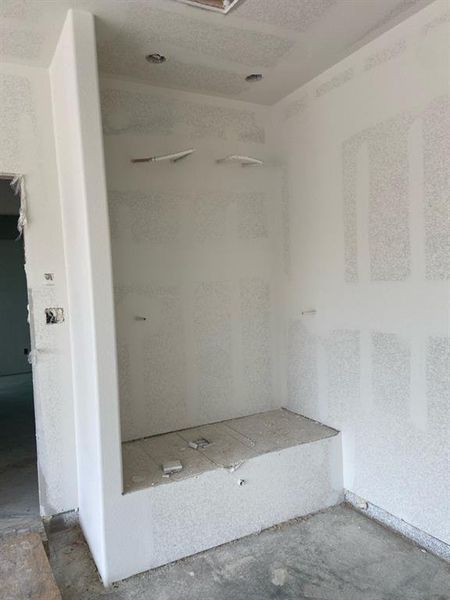 Built-in alcove featuring a white drywall finish, recessed lighting provisions, and pre-wired electrical outlets