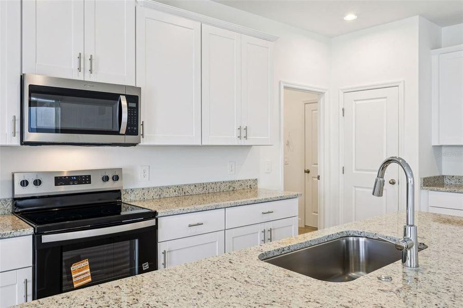 Furnished interior view inside a new home in Cyrene at Minneola - Villas, Minneola (Image 6).