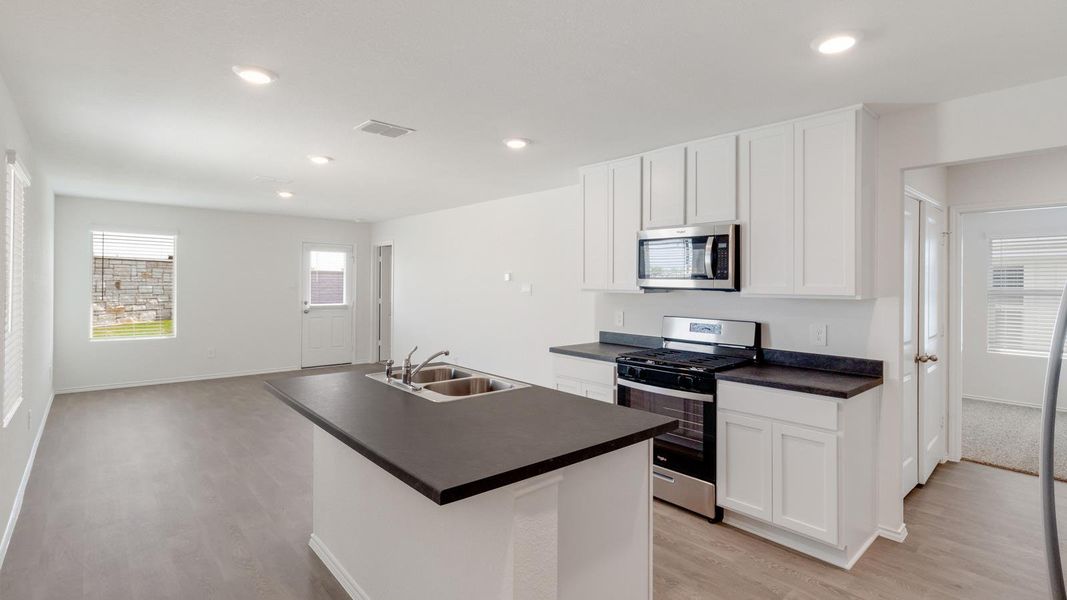 Furnished interior view inside a new home in Wayside, Uhland (Image 5).