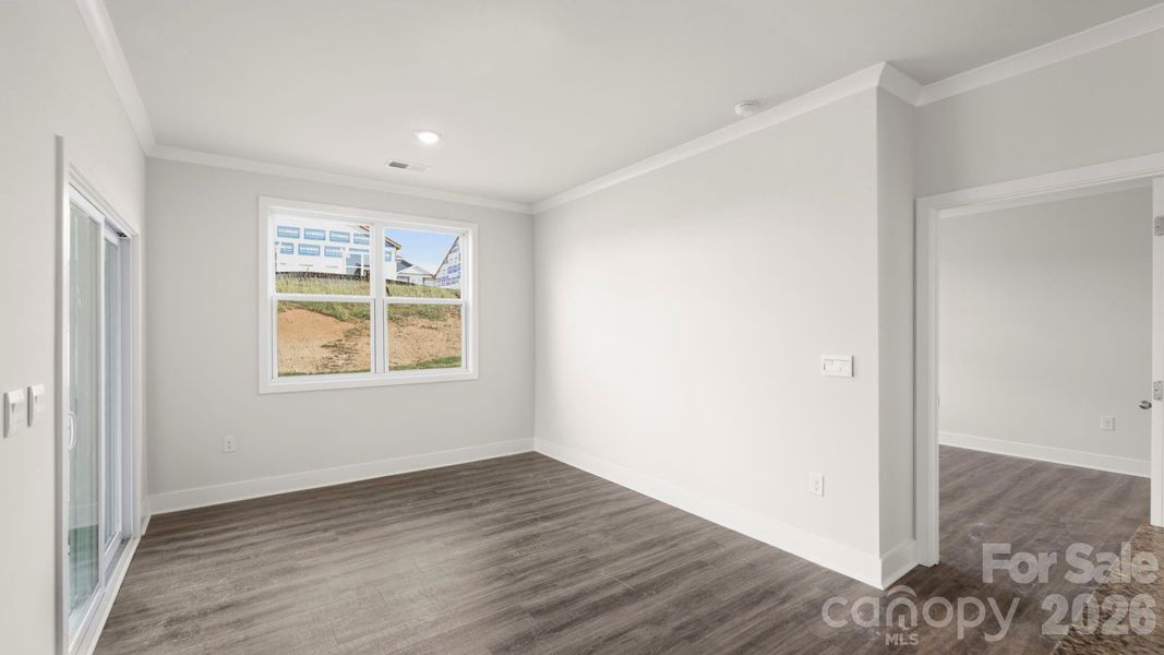 Spacious, unfurnished interior of a new home in Tap Root Farms, Hendersonville (Image 23).