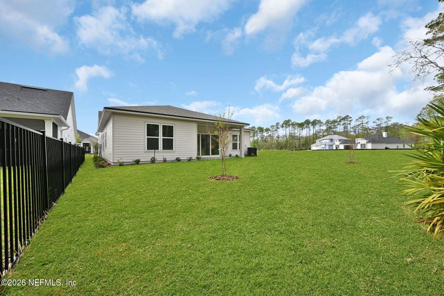 Exterior details and patio area of a home in Amelia National Country Club, Fernandina Beach (Image 22).