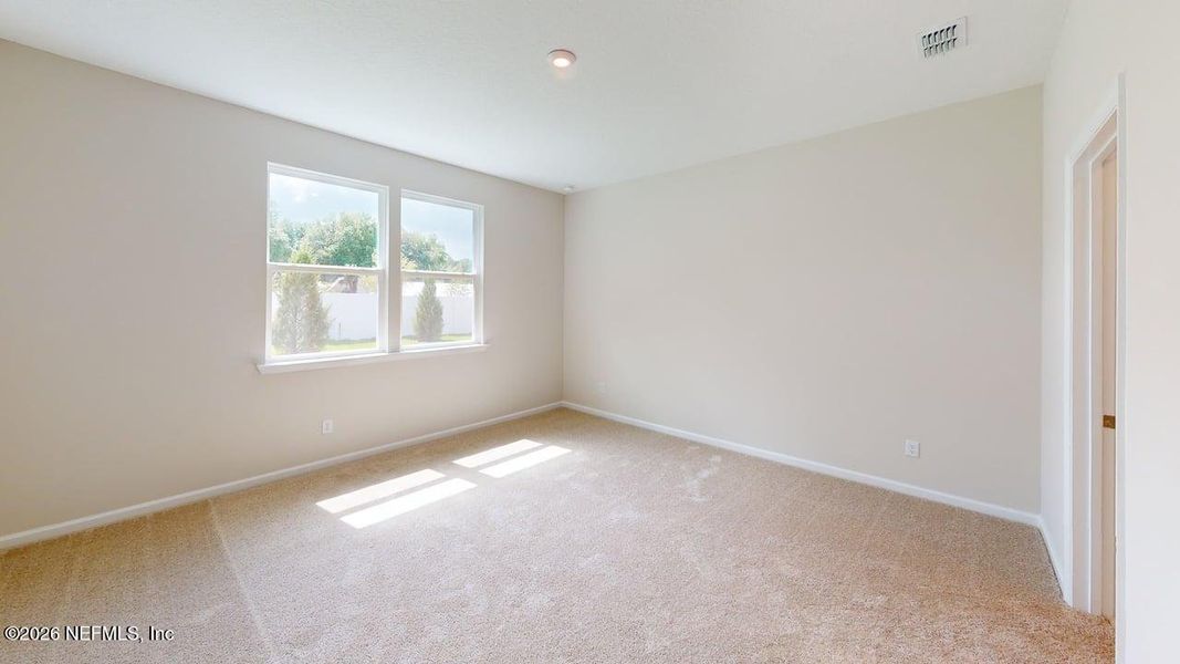 Spacious, unfurnished interior of a new home in Sandridge Hills, Green Cove Springs (Image 9).