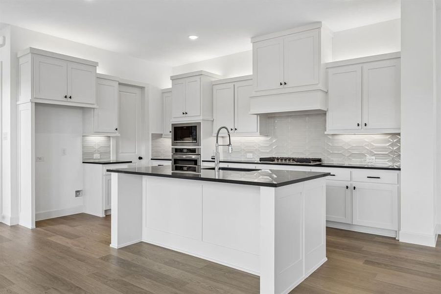 The kitchen island is the hub of your new kitchen and the perfect place for friends and family to gather round!