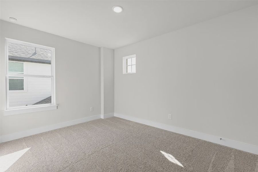 Spacious, unfurnished interior of a new home in The Grove at Blackhawk, Pflugerville (Image 28).
