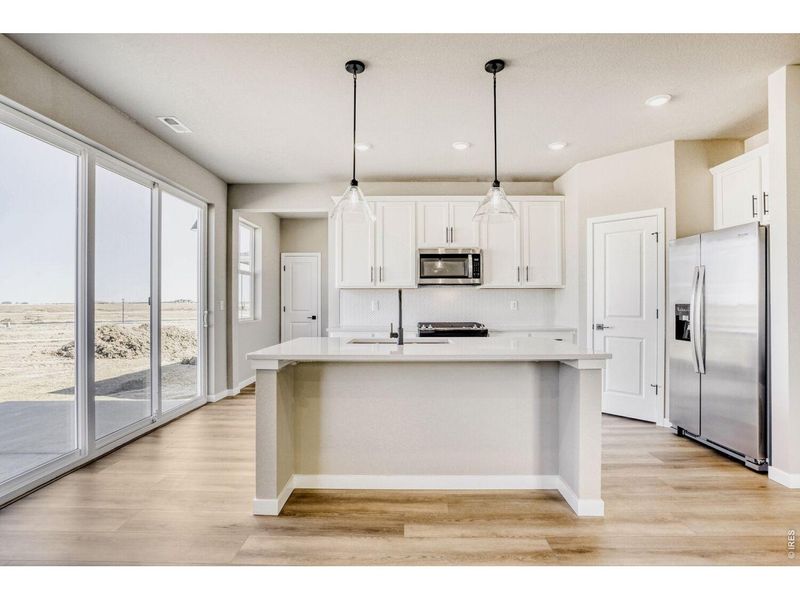 Furnished interior view inside a new home in Farmstead, Berthoud (Image 6). Furnished interior view inside a new home in Farmstead, Berthoud (Image 6).