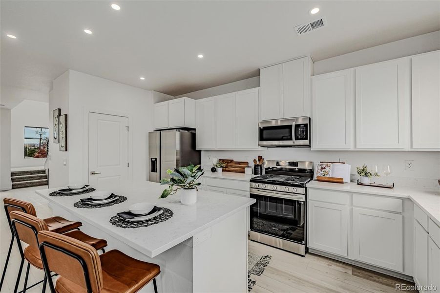 Furnished interior view inside a new home in The Hub at Virginia Village, Denver (Image 15). Furnished interior view inside a new home in The Hub at Virginia Village, Denver (Image 15).