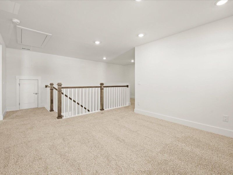 Spacious, unfurnished interior of a new home in The Coves at Lakes of Cane Bay II, Summerville (Image 19). Spacious, unfurnished interior of a new home in The Coves at Lakes of Cane Bay II, Summerville (Image 19).