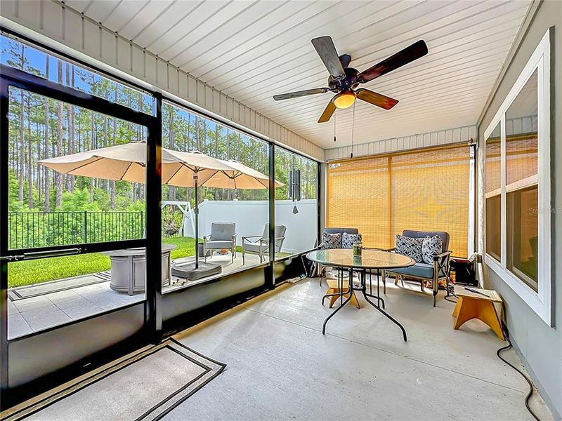 Exterior details and patio area of a home in Sawmill Branch Express, Palm Coast (Image 27).