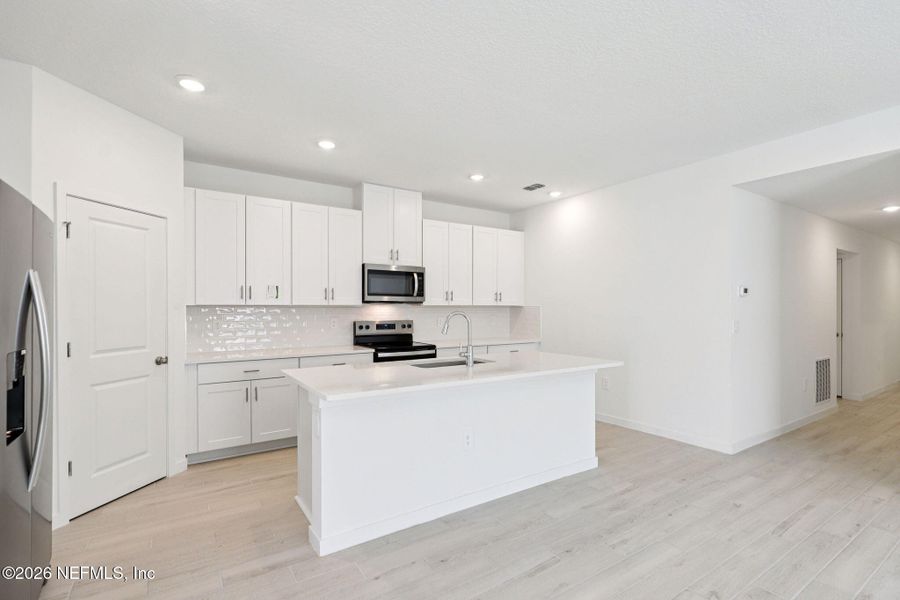 Furnished interior view inside a new home in Flagler Village - Signature Series, Palm Coast (Image 7).