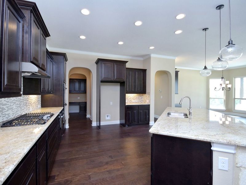 Representative furnished interior of a home built from the Madera II by Giddens Homes in Scofield Farms Estates, Georgetown (Image 224).