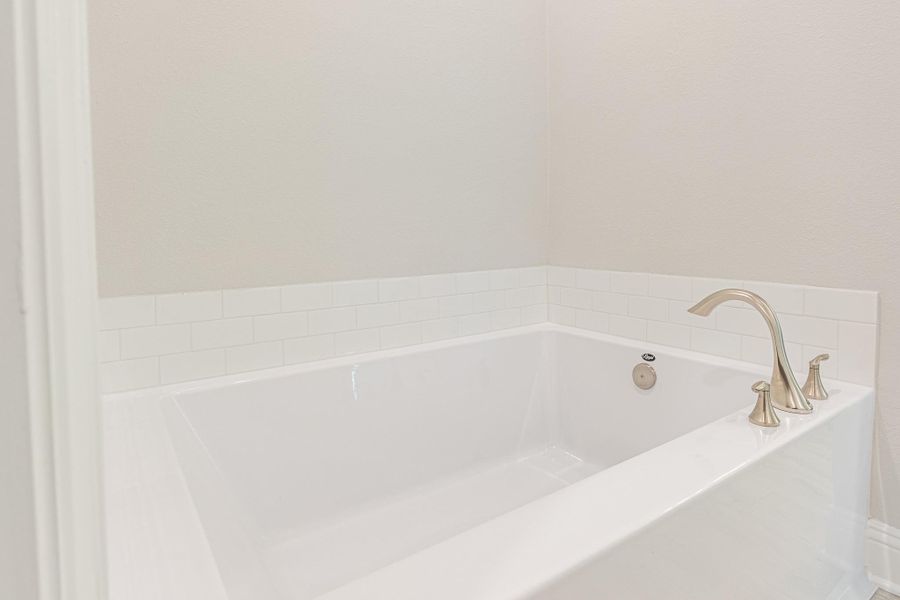 Seperate tub in primary bathroom