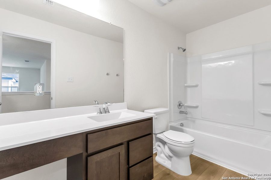 Furnished interior view inside a new home in Medina Crossing, Von Ormy (Image 6).