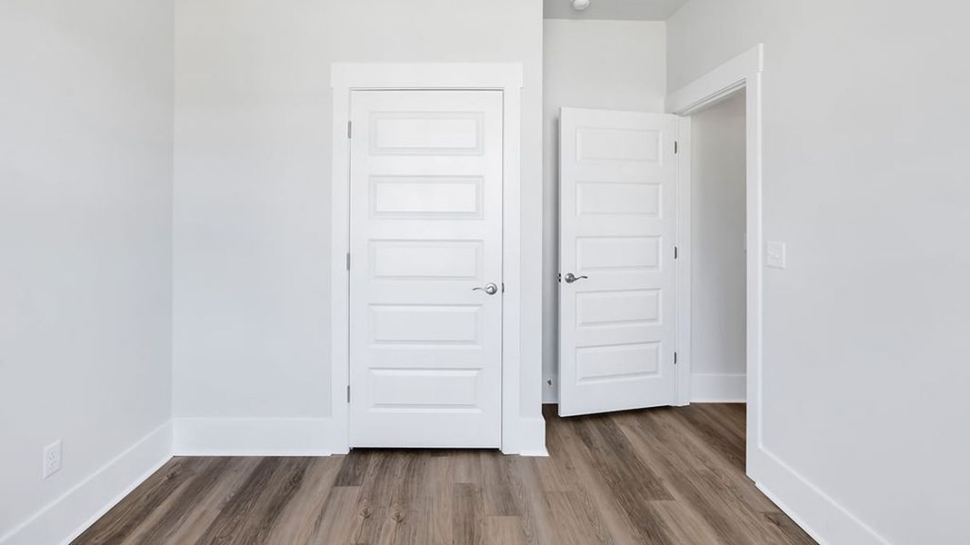 Spacious, unfurnished interior of a new home in The Haven at Indigo Preserve, Leland (Image 21).