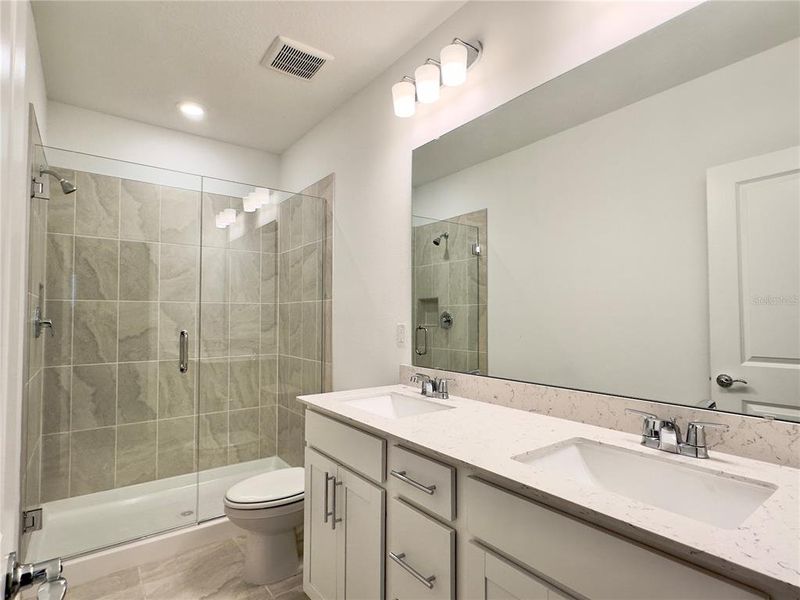 Furnished interior view inside a new home in Parkside Trails, Clermont (Image 14).