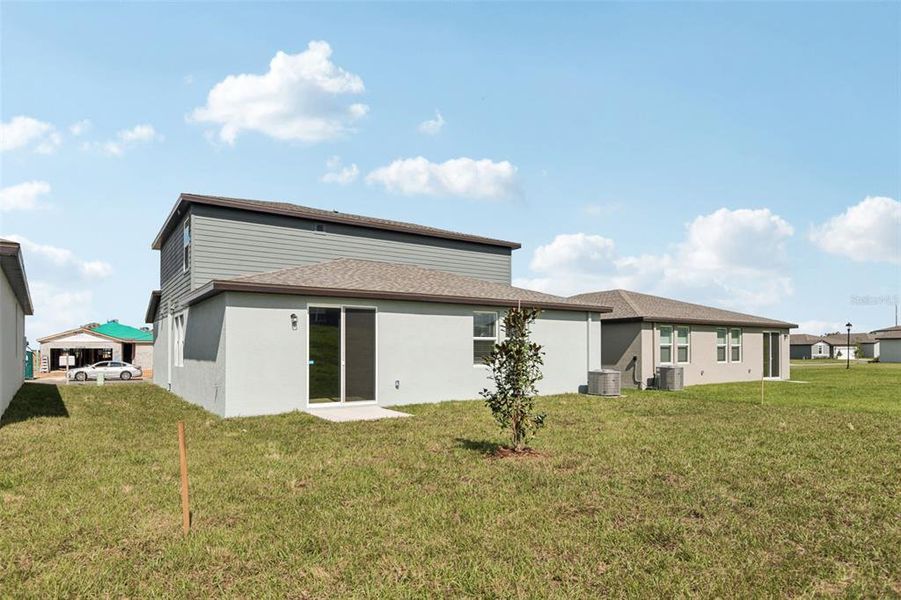 Exterior details and patio area of a home in Benton Hills - Classic Series, Brooksville (Image 3).