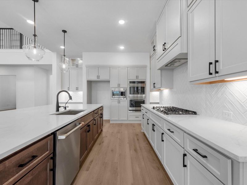 Furnished interior view inside a new home in Woodson’s Reserve, Spring (Image 6).